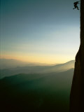 A Rock Climber from the 90 Degree Face of a Mountain Wall