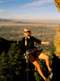 A Woman Pauses for a Portrait While Mountain Climbing