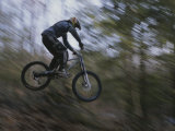 Buy A Boy Flies Through the Air on His Mountain Bike at AllPosters.com