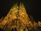 Buy A Night View of Gaudis Temple Expiatori De La Sagrada Familia at AllPosters.com