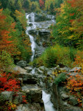 A Stream Runs Swiftly over Rocks