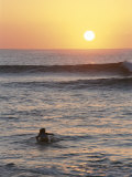 Buy A Woman Paddles out to Sea for Sunset Surfing at AllPosters.com