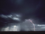 Shot of a Thunderstorm with an Arc of Lightning at Right