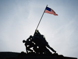 Buy The Iwo Jima Memorial Silhouetted with Flag Flying at AllPosters.com
