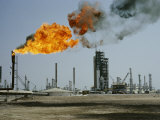 Buy A Flame Spurts from an Oil Refinery in Saudi Arabia at AllPosters.com