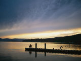Buy A Fisherman at Dawn Tries His Luck from the End of a Pier at AllPosters.com