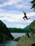 A Climber Freefalls from a Cliff into the Claquot Sound in British Columbia