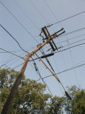 Buy Tangled Wires Stretch in Four Directions from a Telephone Pole at AllPosters.com