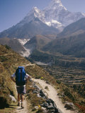 Buy A Hiker Treks Toward Mount Ama Dablam at AllPosters.com