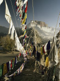 Buy Prayer Flags Hang in the Breeze Below the Potala at AllPosters.com