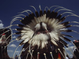 View from Behind of Blood Indians Wearing Tribal Feather Headdresses
