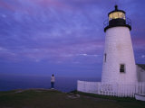 A Lighthouse Visitor Enjoys a Twilight View of the Maine Coast