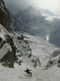 An Extreme Skier in Pas De Chevres Couloir Mount Blanc is in the Background