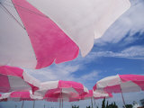 Buy An Arrangement of Pink and White Beach Umbrellas at the Beach at AllPosters.com