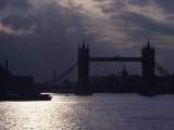 The Recently Renovated Tower Bridge is Nearly Silhouetted against a Cloudy London Sky