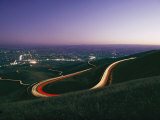 Buy Time Exposure of Headlights Streaking Down a Highway at Twilight at AllPosters.com
