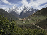 View of a Small Village with Mount Everest in the Background