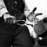 Country Music: Close Up of Spoons Being Played by Man in Overalls
