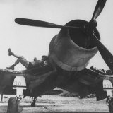 Marines of VMF-222 Relaxing on Wings of Their Aircraft Between Air Strikes