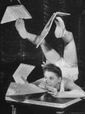 Contortionist Assembling a Dymaxion Map