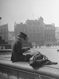 English Woman in Women's Auxiliary Air Force Uniform Reading Magazine with Her Gas Mask Beside Her Premium Photographic Print