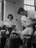 Buy Dentist Examining a Young Boy at AllPosters.com