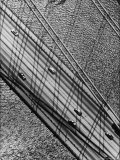 Helicopter View Looking Down on 6 Cars Crossing a Segment of the Whitestone Bridge