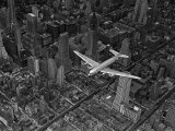 Aerial View of a DC-4 Passenger Plane Flying over Midtown Manhattan