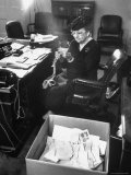 Buy FDR's Secretary of Labor Frances Perkins, Packing Up Souvenirs Including Twine and Box of Letters at AllPosters.com