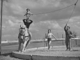 Buy Circus Performers Practicing Stunt at AllPosters.com
