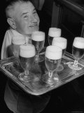 Glasses of Beer Being Served Onboard Oceanliner