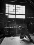 Jackson Pollock Working on a Painting