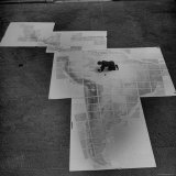 Man Works on Map of Latin and South America under Supervision of Political Geographer Isaiah Bowman