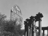 Buy Contrast of Classical Columns with Pabst Blue Ribbon Electrical Sign at AllPosters.com