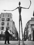 Skeletal Giacometti Sculpture on Parisian Street