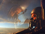 Pilot's Face Reflected in Cockpit Canopy While in Flight