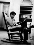 President John F. Kennedy Sitting Alone, Thoughtfully, in His Rocking Chair in the Oval Office