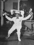 Waiter Dancing with a Tray on His Head