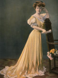 Woman Modeling Yellow Green Robe du Soir with White Lace Trim Designed by Raudnitz
