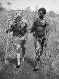 Buy Papuan Native Helping a Wounded Australian Infantryman Along Road Away from the Buna Battlefront at AllPosters.com