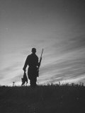 Pheasant Hunter Carrying Bird That He Killed