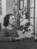 Young Child Starring at Marionette Muffin the Mule