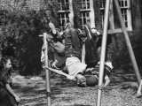 Buy Springtime in Clarksville, While School Kids Playing During Recesses at AllPosters.com