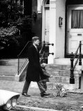 President Elect, John F. Kennedy, Taking a Walk with Daughter Caroline and Her Doll Carriage