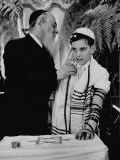 Buy Rabbi David S. Novoseller Adjusting Carl Jay Bodek's Robe During Ceremony at AllPosters.com
