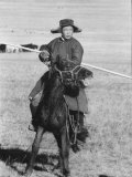 Shaggy Horse is Ridden by Mongolian Herdsman