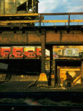 Buy Moody Sunlight Showing Arty Grouping of Hopper Car, Rusting Elevated Span, Trucks, Etc at AllPosters.com