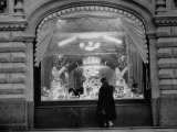 Woman Looking Into a Store Window