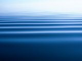 Small Gentle Ripples Move Across the Calm Surface of the Arctic Ocean