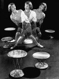 Multiple Exposure Showing Woman Oscillating on a Teeter Seat Designed by Isamu Noguchi
